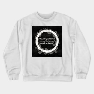 It is during our darkest moments that we must focus to see the light. Crewneck Sweatshirt